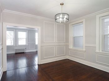 A room with white walls and a wooden floor at The Packard, West Hartford, Connecticut, 06119